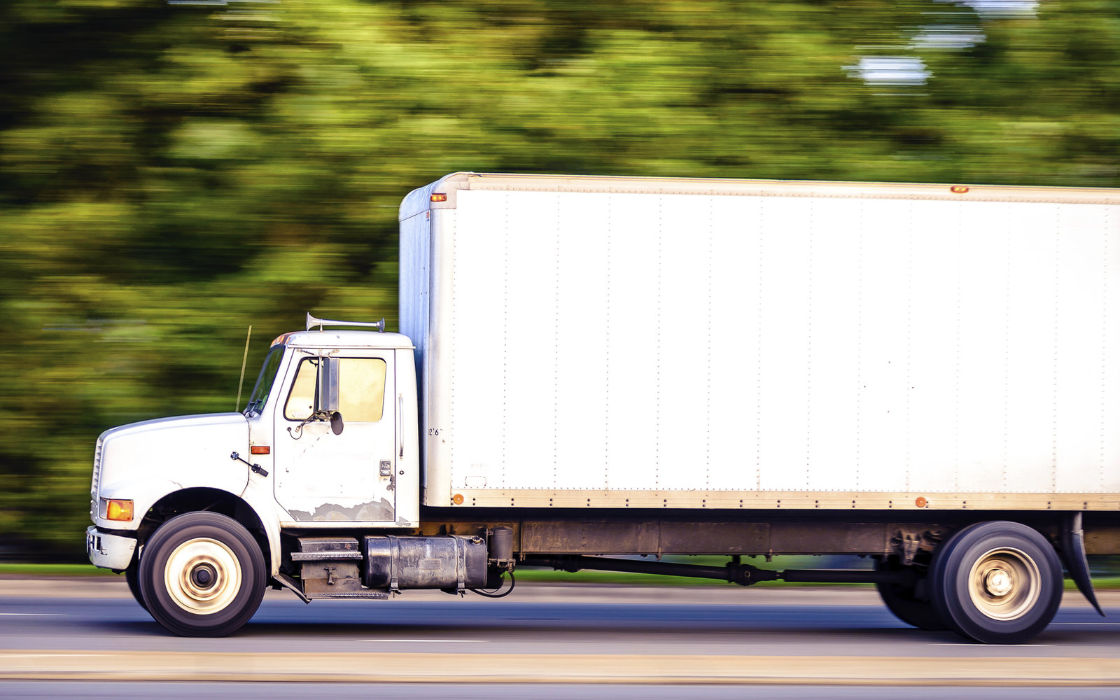 Coyne's Moving truck on the highway in New Jersey